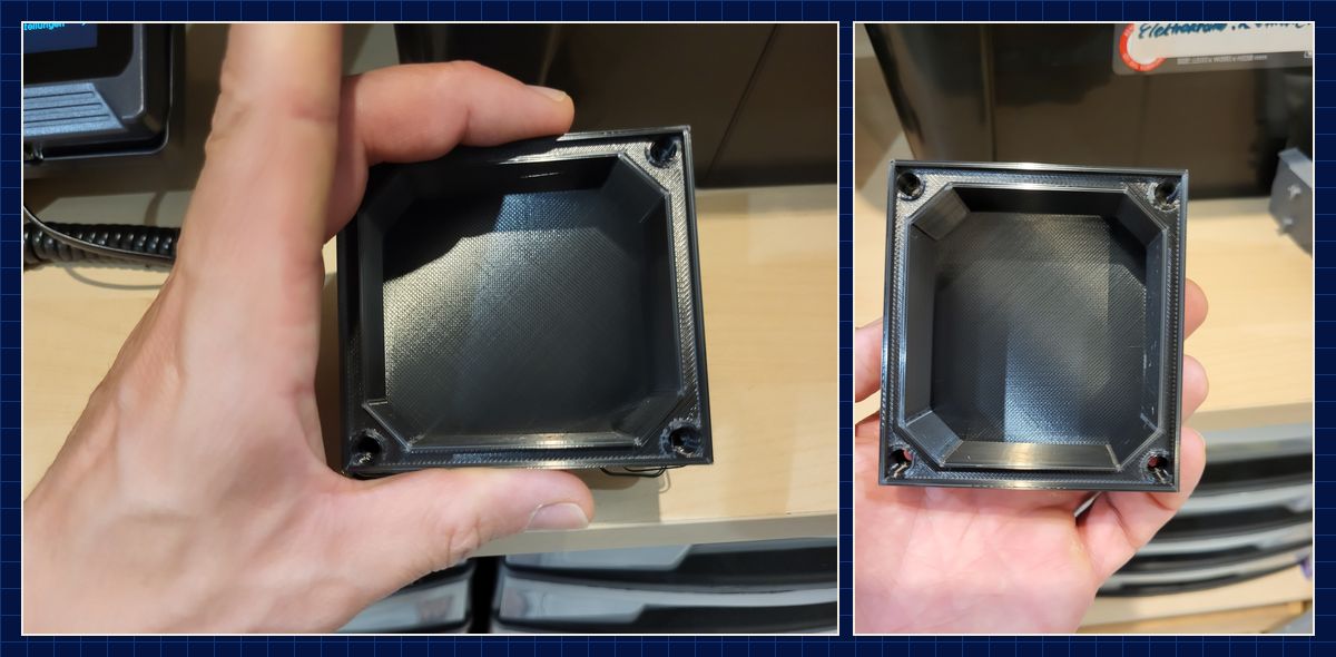 Gedruckte schwarze Abdeckung für ein Motorgehäuse in der Hand