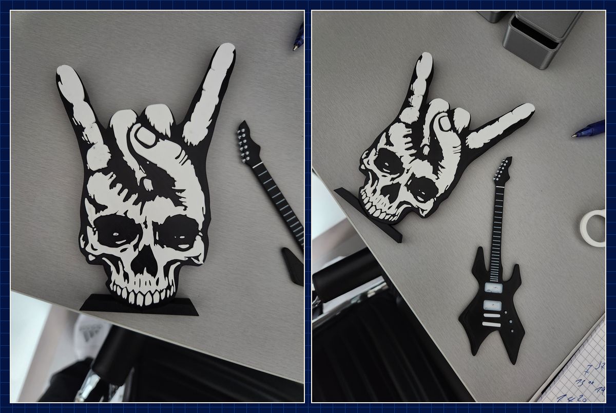 Gedruckte Schädelhand und Gitarre als Metal-Wandmotive